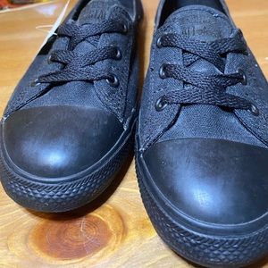 Converse All Black slide-on shoes